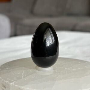 Black obsidian crystal egg carving